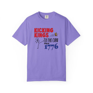 Purple t-shirt  with 'Kicking Kings to the Curb since 1776' text and graphics on a white background.