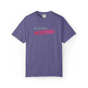 Purple t-shirt with embroidered text that says Pass the Potatoes 