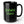 Black mug with green text 'EWWW, PEOPLE.' on a white background