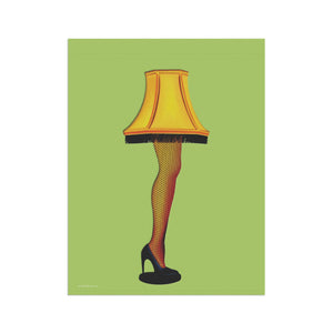 A square art print featuring a stylized illustration of a lamp shaped like a female leg in fishnet stockings and a black high heel, set against a solid light green background.