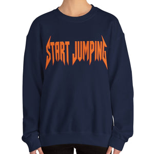 Close up of a navy blue sweatshirt that says Start Jumping
