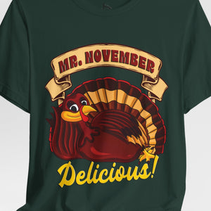 Person wearing a Aqua t-shirt with 'Mr. November Turkey Funny Thanksgiving' design on a plain background