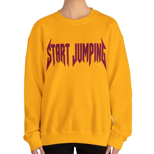 Close up of a yellow sweatshirt that says Start Jumping