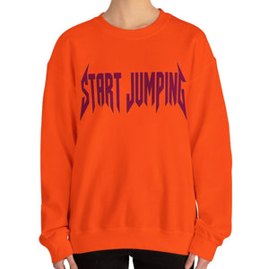 Close up of an orange sweatshirt that says Start Jumping