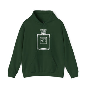 Sand hoodie with 'Love Potion Perfume Witchy Halloween' design on a plain background