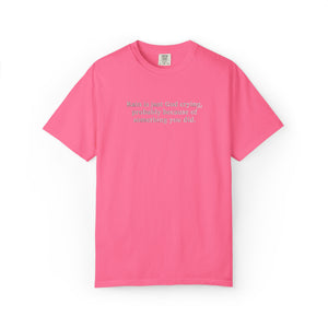 Pink t-shirt with 'Rain is just God crying, probably because of something  you did." embroidered text on a white background