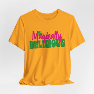 Charity pink t-shirt with 'Magically Delicious Funny St. Patrick's Day' design on a white background