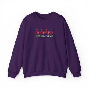 Purple sweatshirt that reads ho ho ho'n around town in red and green text.