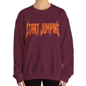 Close up of a maroon sweatshirt that says Start Jumping