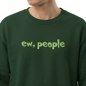 close up of a green sweatshirt with 'ew, people' embroidered 