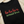  black sweatshirt that reads ho ho ho'n around town in red and green text.