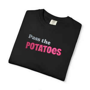 folded black t-shirt with embroidered text that says Pass the Potatoes 