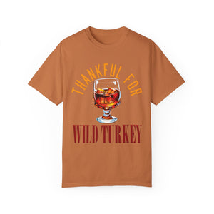 Pink t-shirt with 'Wild Turkey Funny Holiday' design on a white background