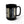 A black ceramic mug featuring a printed graphic of five gothic book spines with gothic-themed quotes, shown on a clean white background.