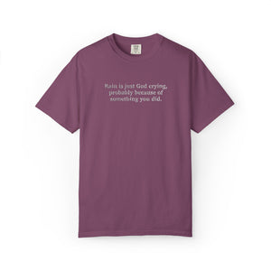 Berry t-shirt with 'Rain is just God crying, probably because of something  you did." embroidered text on a white background