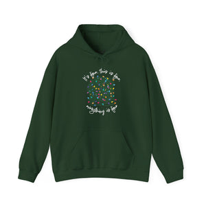 Green sweatshirt hoodie with a graphic of a ball of tangled Christmas lights and text that says 'It's fine, this is fine, everything is fine'.