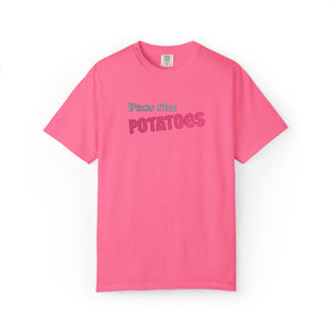 Pink t-shirt with embroidered text that says Pass the Potatoes 