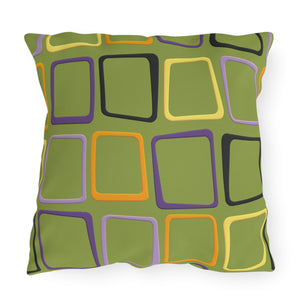 A square outdoor patio pillow with a modern retro design featuring geometric shapes in green, purple, and orange colors.