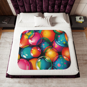 Soft sherpa blanket with 'Bouncy Balls' design