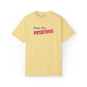yellow t-shirt with embroidered text that says Pass the Potatoes 