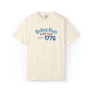 Beige t-shirt with colorful text on a white background