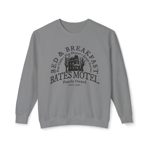 Dark sweatshirt with 'Bates Motel Halloween Fall' design on a plain background
