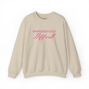 beige sweatshirt with embroidered pink text 'unapologetically difficult'