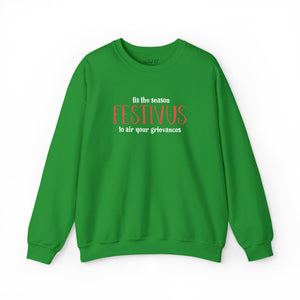 Bright green sweatshirt that reads Festivus tis the season to air your grievances.