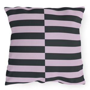 A square-shaped throw pillow with a striped pattern in black and purple colors.