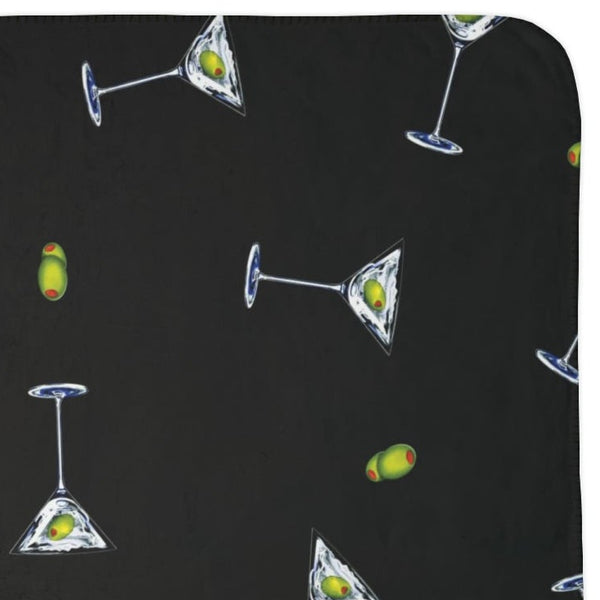 Black blanket with martini glass and lime pattern on a white background