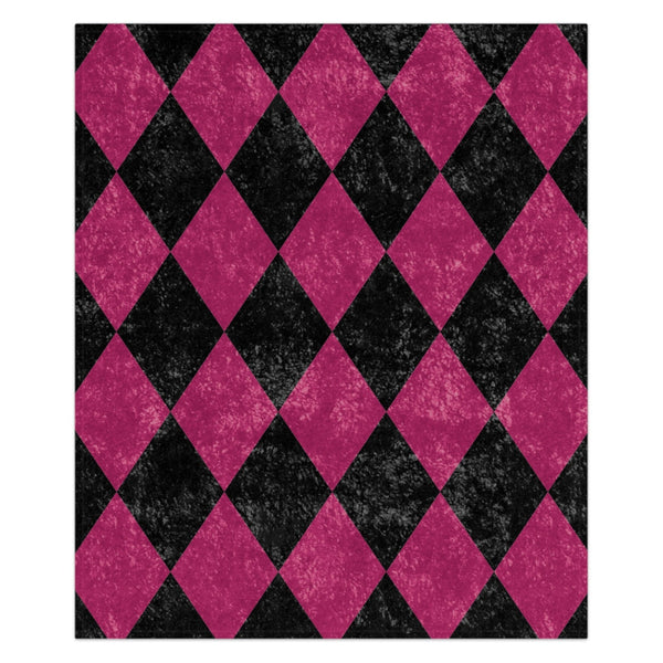 Harlequin pattern with black and pink diamonds on a white background