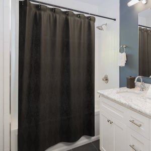 Bathroom with a black shower curtain, white vanity, and gray walls.