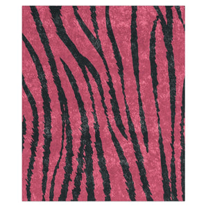 A decorative throw blanket with pink and dark grey striped animal print, featuring a shiny finish and hemmed edges.