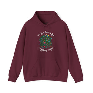 Maroon sweatshirt hoodie with a graphic of a ball of tangled Christmas lights and text that says 'It's fine, this is fine, everything is fine'.