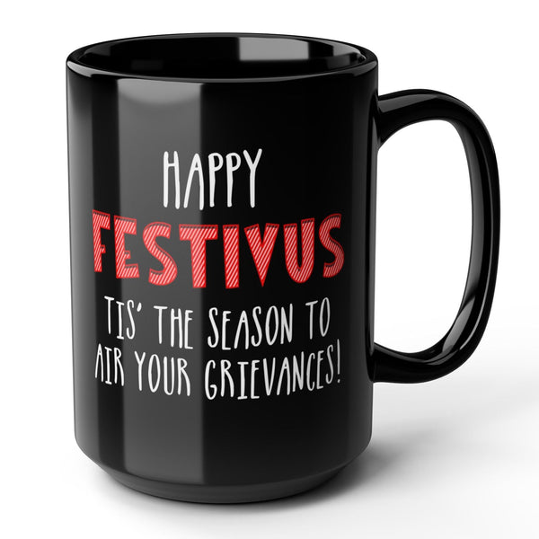 Black mug with 'Happy Festivus' text on a white background