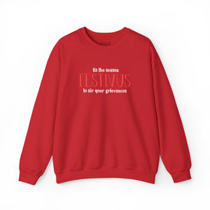Red sweatshirt that reads Festivus tis the season to air your grievances.