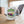 A white ceramic mug with a colorful graphic design featuring a pink car and the text 'Instructor Toonce's Stunt Driving'.