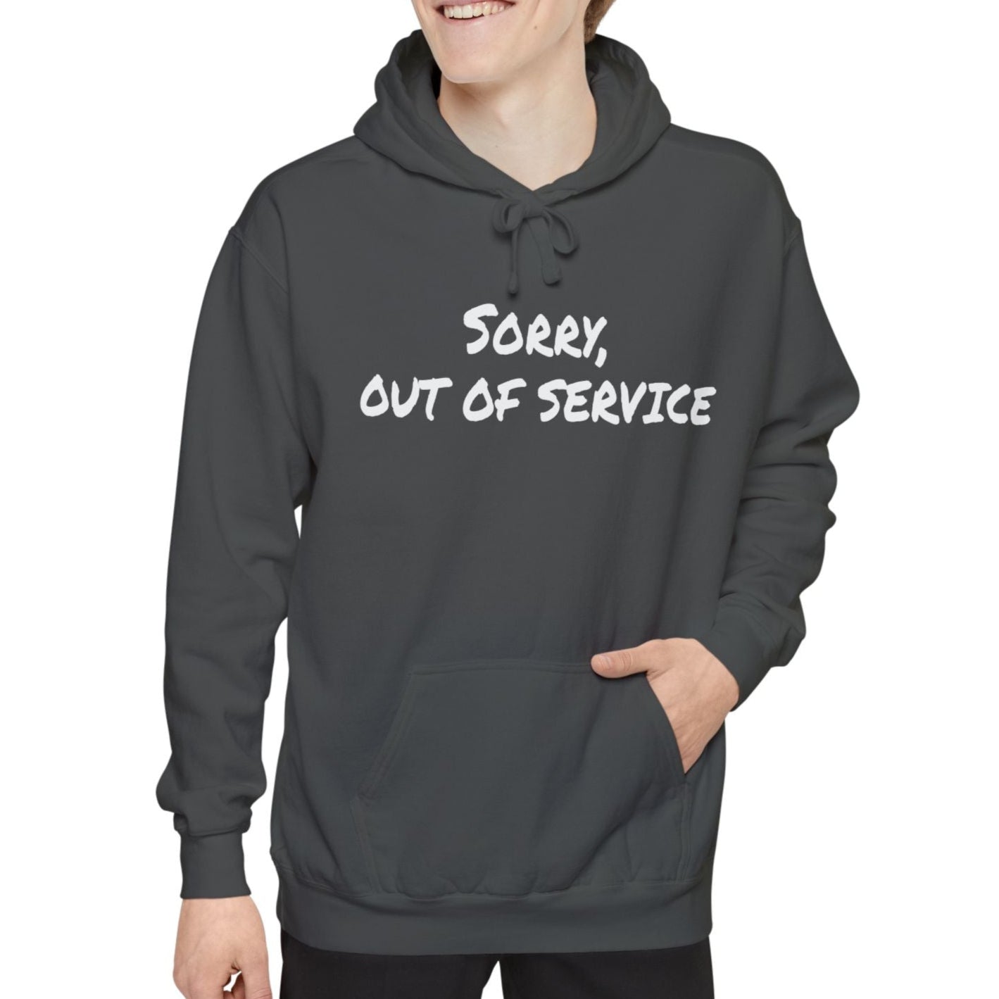 Person wearing a gray hoodie with 'Sorry, Out of Service' text on a white background