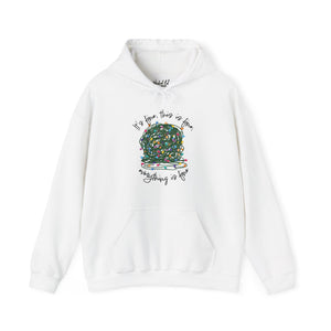 White sweatshirt hoodie with a graphic of a ball of tangled Christmas lights and text that says 'It's fine, this is fine, everything is fine'.