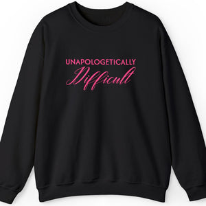 Black sweatshirt with embroidered pink text 'unapologetically difficult'