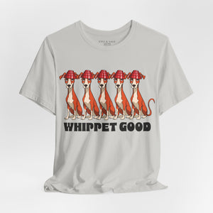 Pink t-shirt with 'Whippet Good Devo 80's Music Funny' design on a white background