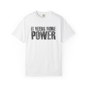 White t-shirt with 'IT NEEDS MORE POWER' text on a white background