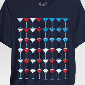 Person wearing a Baby Blue t-shirt with 'Martini American Patriotic July 4th' design on a plain background
