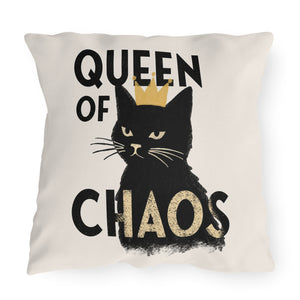 Decorative accent pillow with the text 'QUEEN OF CHAOS' and an image of a black cat wearing a crown in a stylized design.