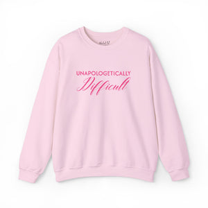 pink sweatshirt with embroidered pink text 'unapologetically difficult'