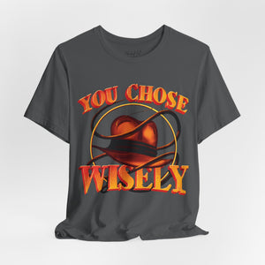 Charity pink t-shirt with '80s Movies Pop Culture Action Novelty' design on a white background