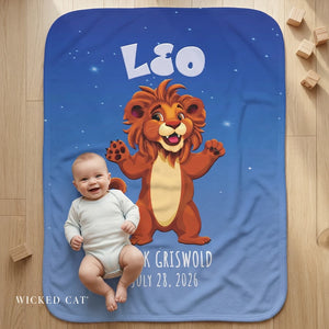 Baby lying on a blue blanket with a cartoon lion and personalized text