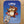 Baby with cartoon squirrel holding scales on a 'Libra' themed blanket