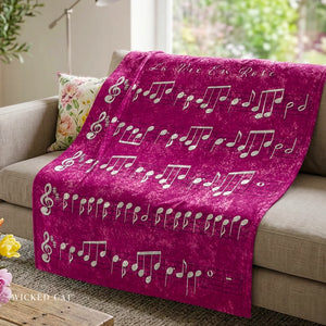 Soft sherpa blanket with 'La Vie En Rose Sheet Music Pink Decorative Throw' design