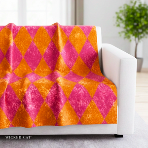 Soft sherpa blanket with 'Pink & Orange Harlequin Decorative Throw' design
